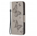 Xiaomi Redmi Note 10/10S/Poco M5s Tasche Gedruckte Schmetterlinge mit Riemen
